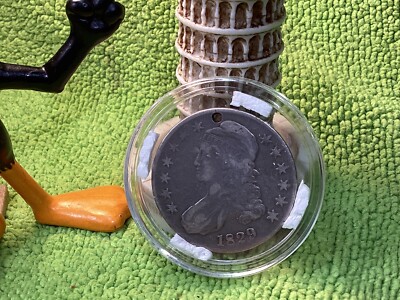 1929 CAPPED BUST HALF DOLLAR SM HOLE AT 12 O CLOCK IN AIRTITE 