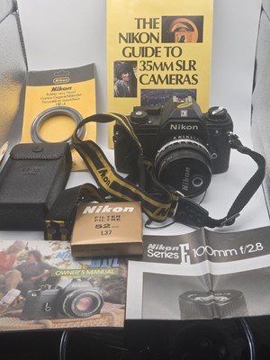 Nikon EM Film Camera with Nikon 50mm Series-E Lens/ Flash And