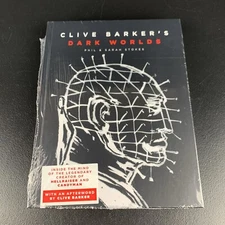 2078A     Clive Barker’s Dark Worlds By Phil and Sarah Stokes Sealed In Plastic