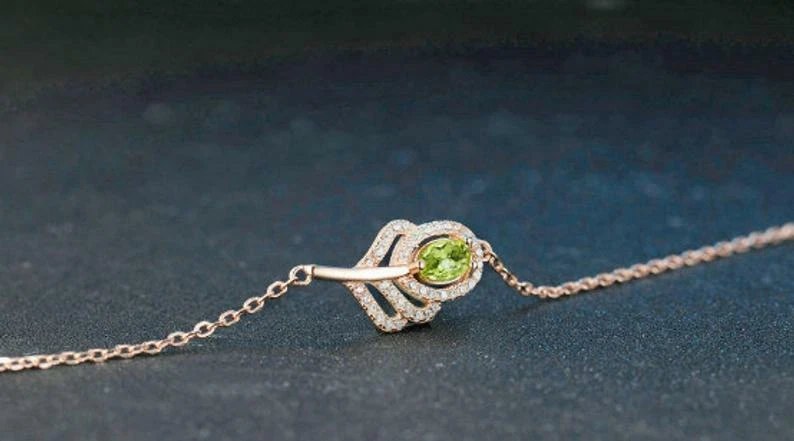 Oval Cut Green Peridot With Sparklign CZ Classic Leaf 14k Rose Gold Bracelets - Image 3 of 4