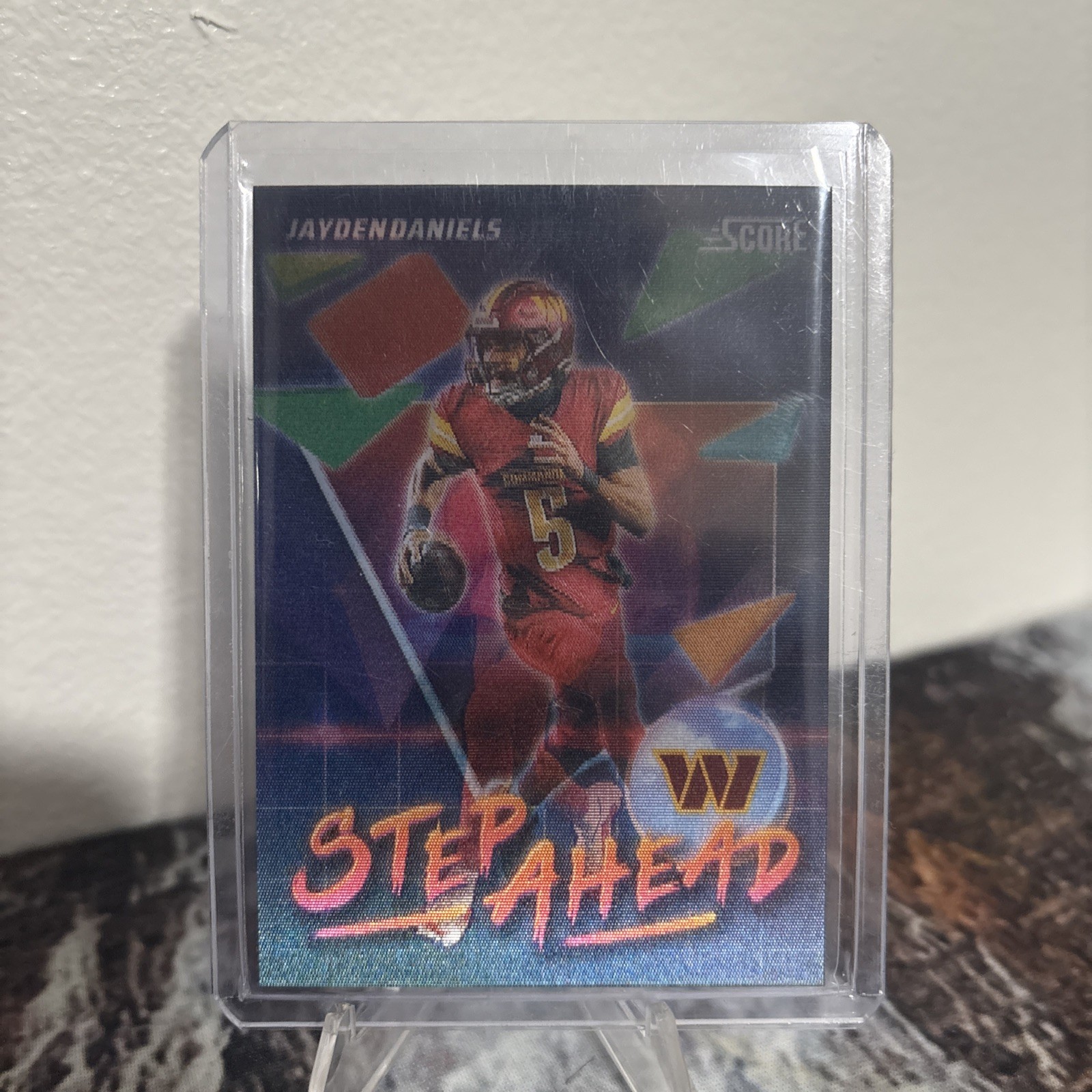 2025 Panini NFL Score STEP AHEAD Jayden Daniels SSP Case Hit