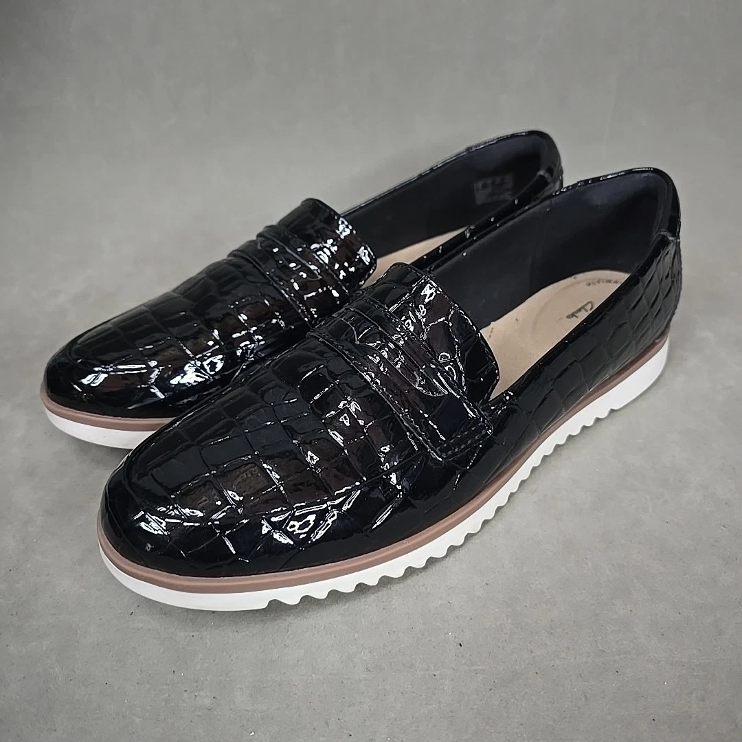 Mocassino donna Clarks Serena Terri piatto 11N nero suola bianca