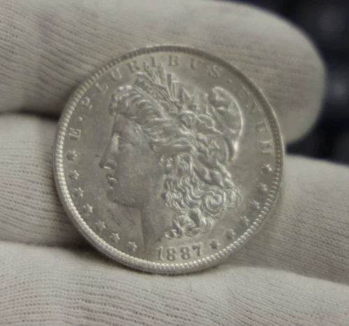 1887 O US Morgan Silver Dollar $1 AU (Cleaned,Scratch)