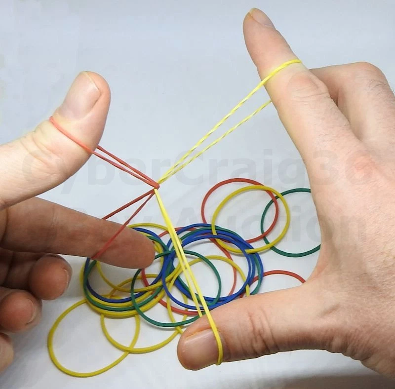 Rubber band magic trick deals