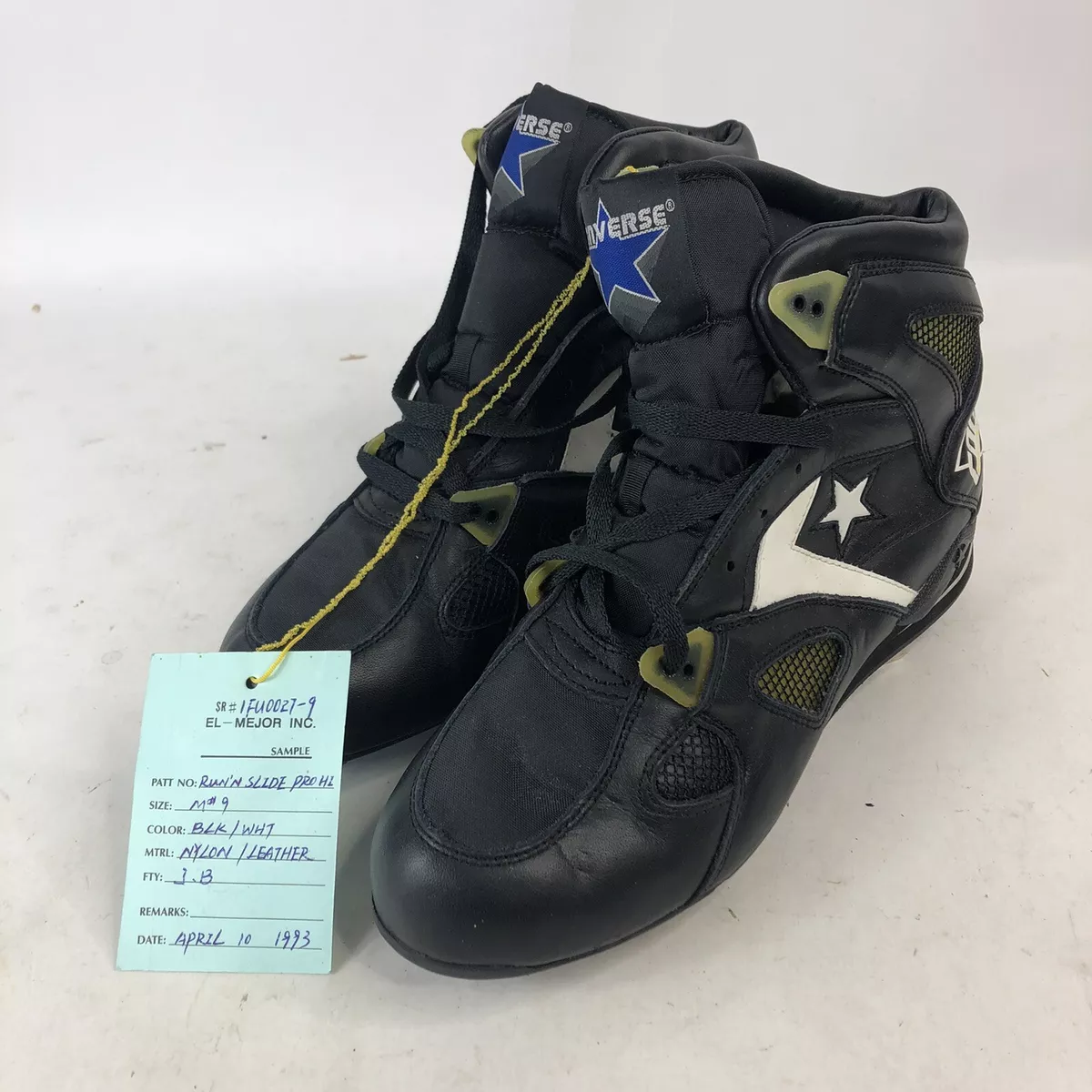 Black converse top baseball cleats