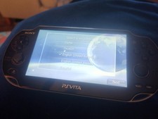 Sony PlayStation Vita PCH-1003 Handheld Console Black, charger, 4gb SD card