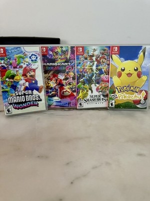 Nintendo Switch OLED 4-Player Bundle – 9 Games (Mario Wonder