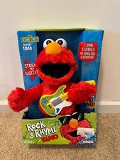 Sesame Street Rock Rhyme Elmo Talking, Singing Plush Toy English Spanish NIB