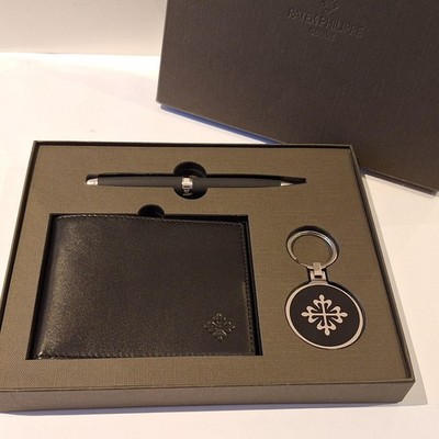 Patek Philippe Caran d'Ache  pen, wallet, key ring set
