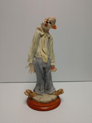 Hobo Clown With Squirrel. Hobo Clown With Cat And Fish