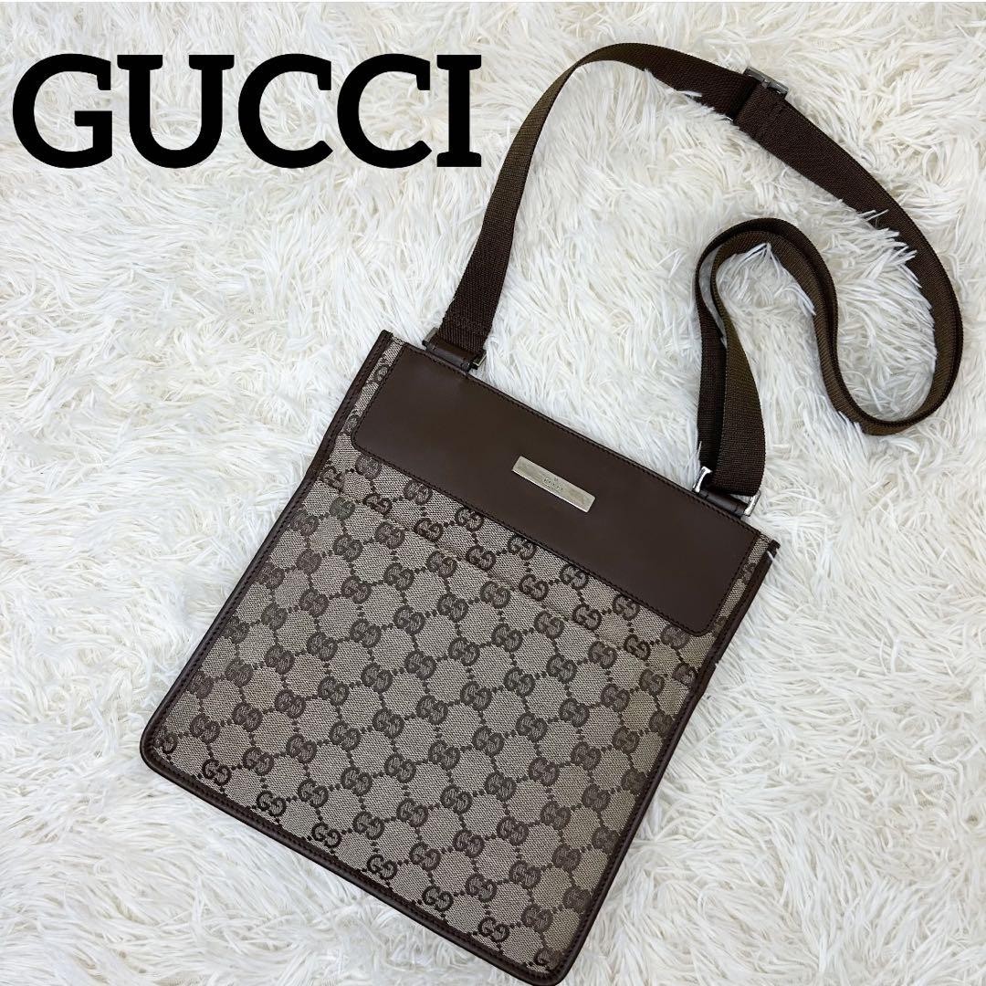 Gucci GG Canvas Leather Unisex Shoulder Bag for Casual or Formal Wear
