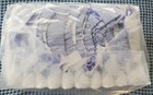 ABU Cushies plastic back XL in clear plastic, with blue and white label and multiple white cotton swabs.