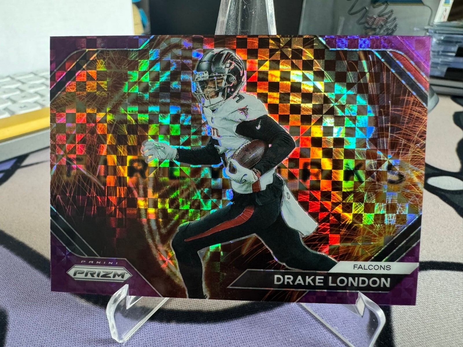 2023 Panini Prizm Drake London Purple Fireworks 15/49 Falcons