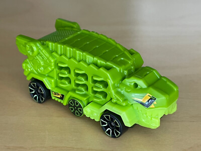  Hot Wheels Spielzeug Auto HW Ultimate T-Rex Transporter / Experimotors  