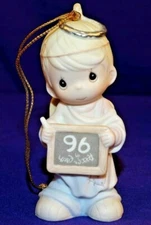 1996 PRECIOUS MOMENTS CHRISTMAS ORNAMENT PEACE ON EARTH .... ANYWAY (BOY ANGEL)
