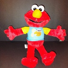 Sesame Street 13-inch Sing-Along Elmo, Lights and Sounds, Pre-Owned Excellent