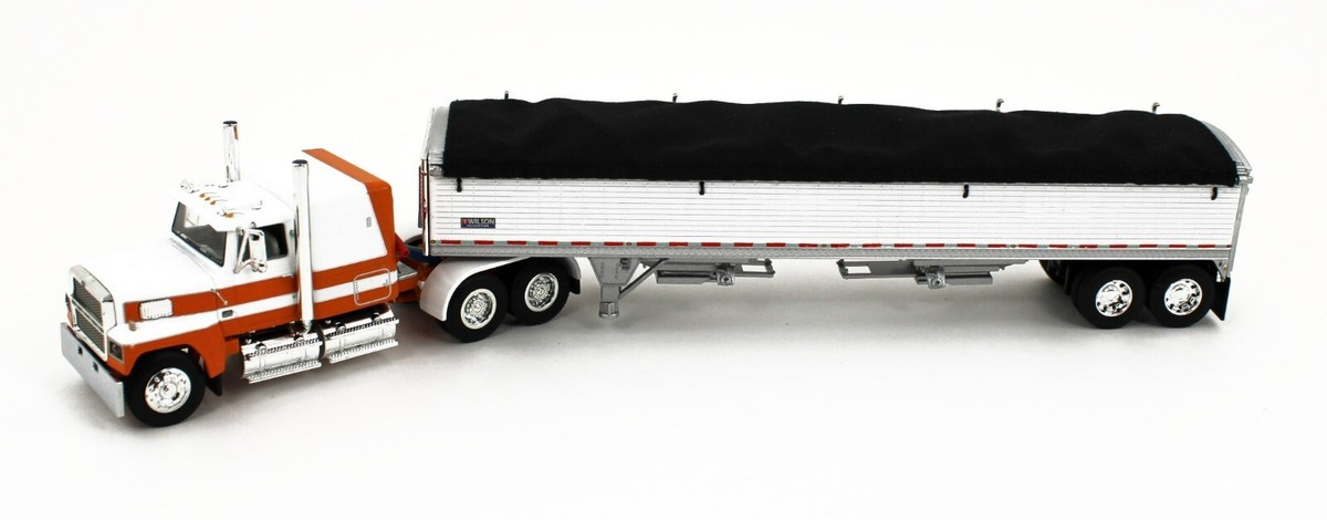 DCP ダイキャストプロモーション 1/64 TRACTOR-TRAILER Amazon.com: DCP 1/64 Wisteria/White Kenworth W900L w/ 31ft