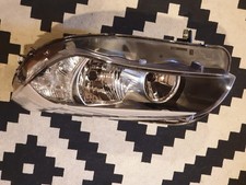 BMW X1 E84 Headlights PAIR 2009-2014 – NEW – TYC 20-H112-05-2B & 20-H111-05-2B