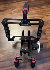 DSLR Camera Cage with Removable Follow Focus, 15mm Rods, Top Handle, Rod Handles