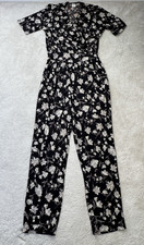KIM CO BLACK FLORAL SHORT SLEEVE RUFFLE V-NECK JUMPSUIT SIZE XL, POCKETS