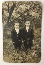 Little Boys Wearing Caps Posing in Woods RPPC CYCO Antique PC Children