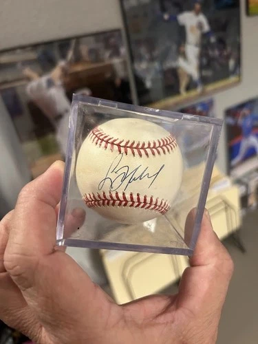 Greg Maddux signed National League baseball autograph