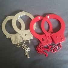 2 Sets Of Toy Handcuffs Both With Keys