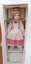 PARADISE GALLERIES PORCELAIN DOLL--CANDY CANE