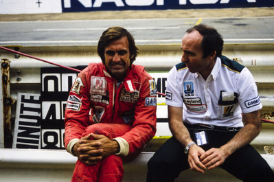 Carlos Reutemann and Frank WIlliams sit on Armco barrier 1981 F1 Old Photo