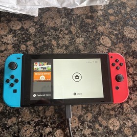 Nintendo Switch with Neon Blue and Red Joy-Cons, Dock, Charger and Accessories