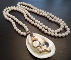 STUNNING VINTAGE ESTATE IND KNOT MILK GLASS CROSS SHELL 35" NECKLACE! G23627