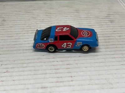 #43 old mobile stp gm slot car blue