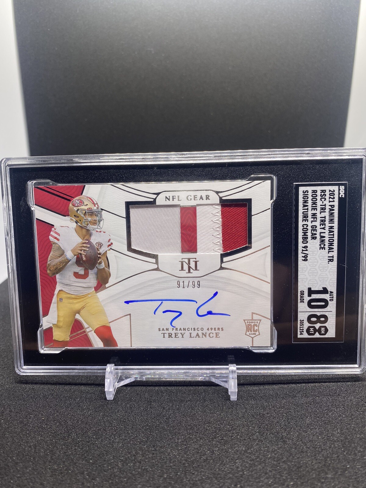 2021 National Treasures Rookie NFL Gear Signature 91/99 Trey Lance RC Patch Auto
