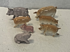 Porcelain Pigs 7 Piece Set