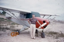 XX113- vv Old 35mm Slide Photo- Man-Small Airplane-Red Kodachrome - 1954