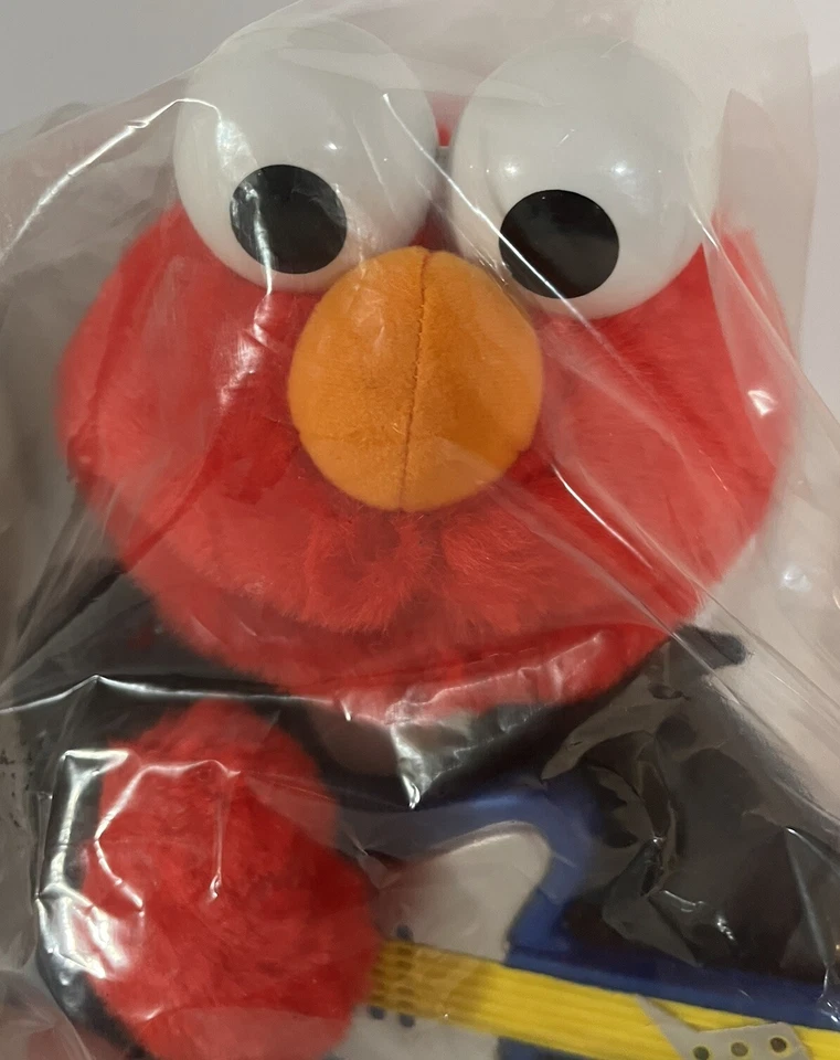 Guitarra de peluche Rock N Roll Elmo toca música canta y agita 1997 Avon primer lanzamiento Foto 3 de 4