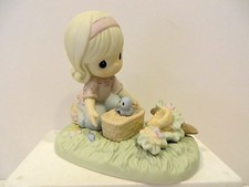 PRECIOUS MOMENTS  IT ONLY TAKES A MOMENT TO SHOW YOU CARE  FIGURINE