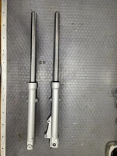 Motorcycle front fork suspension 33mm diameter fork tubes.  Brand new.