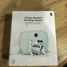 Printing camera for instant black white pictures