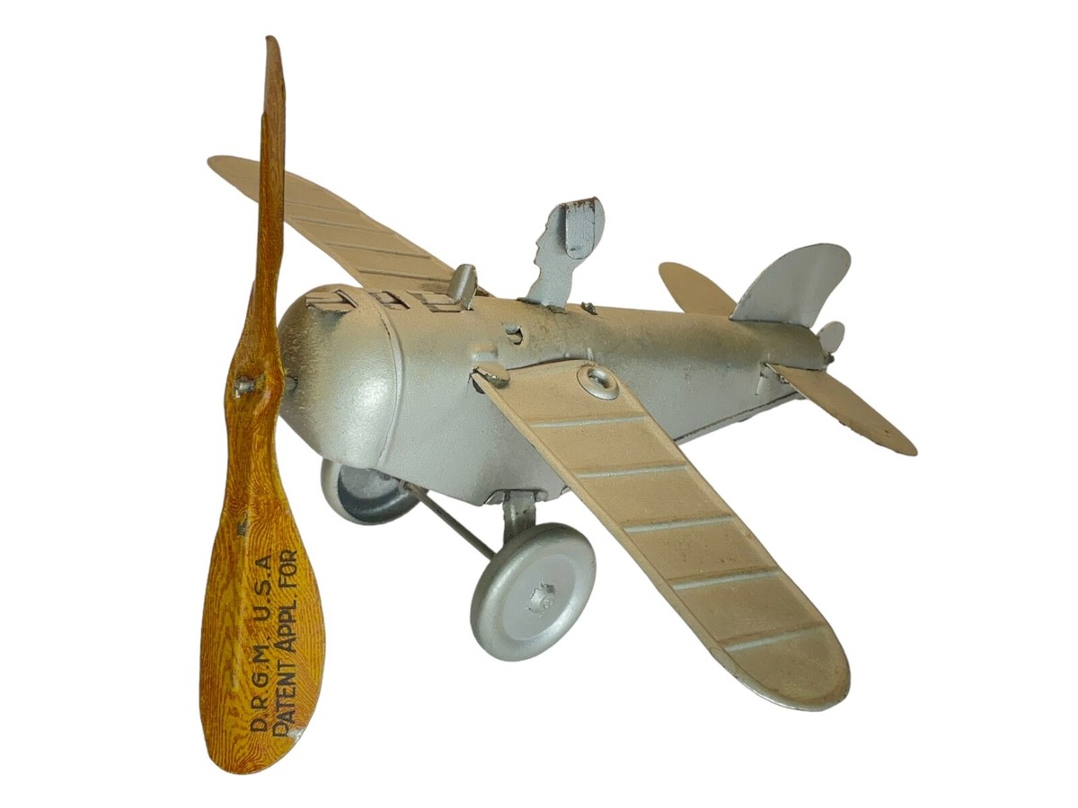 Rare 1920s Gebruder Bing folding wing tin windup German Airplane