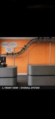 White Stor-U-Veyor Up N Down 500 Slot Garment Conveyor Working