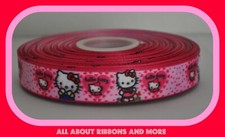7/8 INCH HELLO KITTY WITH LITTLE HEARTS ON LIGHT PINK GROSGRAIN RIBBON-1 YD