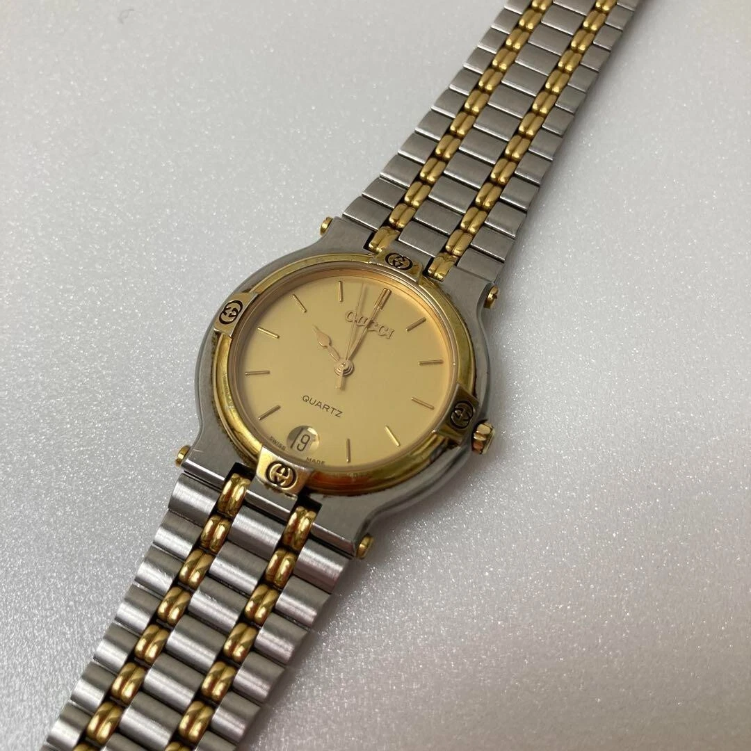 Gucci gold and silver watch sales