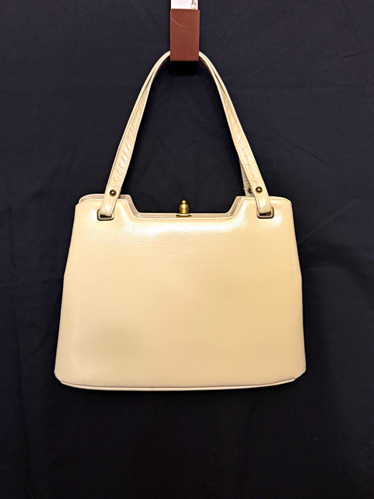 Cream leather structured top-handle box bag with gold clasp