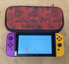 Nintendo Switch Console with Neon Purple/Neon Orange Joy-Con Controllers