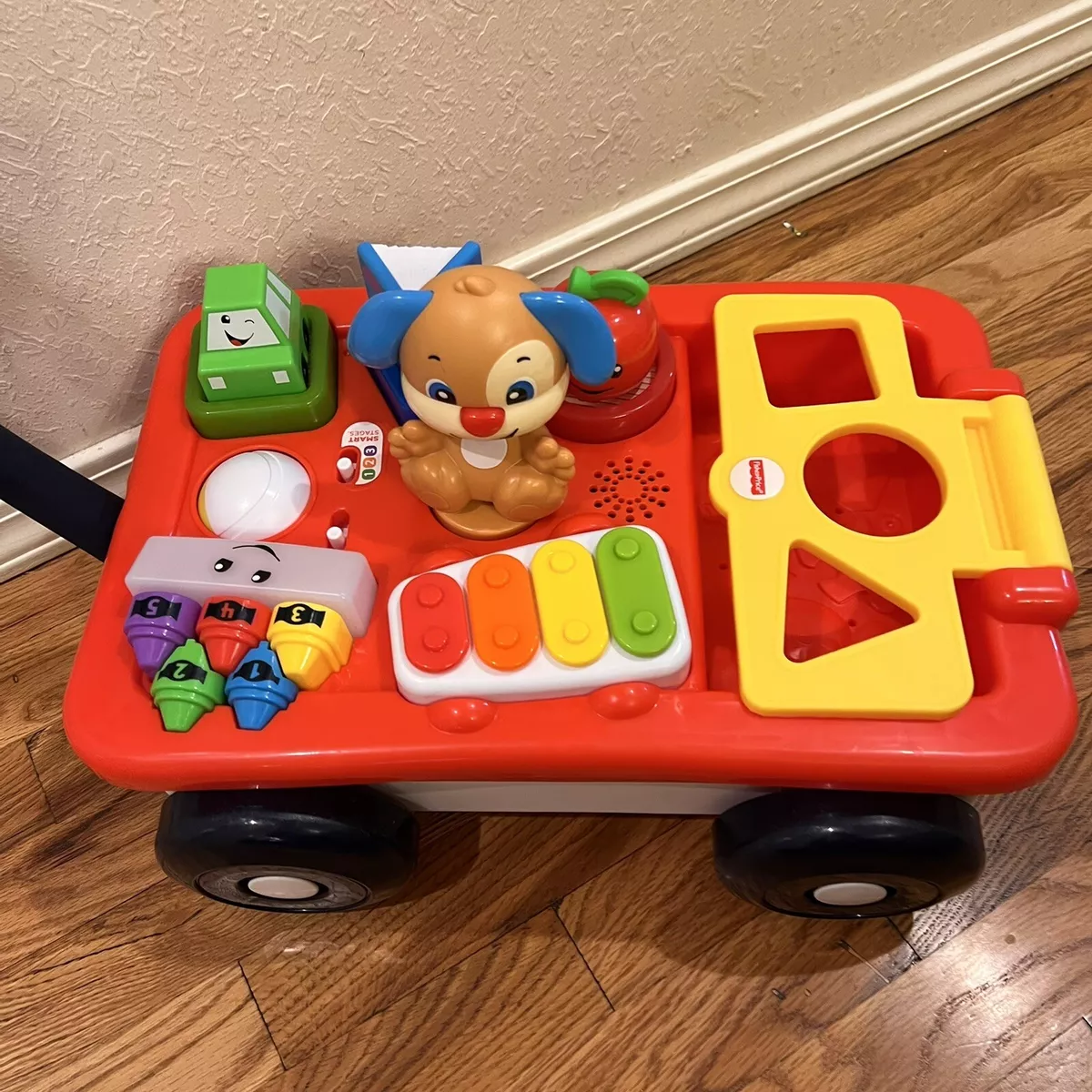 Fisher-Price Laugh & Learn Baby & Toddler Toy, Pull & Play Learning Wagon  with Smart Stages & 4 Pieces for Ages 6+ Months