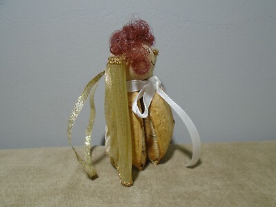 木製エンジェル HAND MADE DELICATE WOOD & SEED POD ANGEL ORNAMENT (CB2029