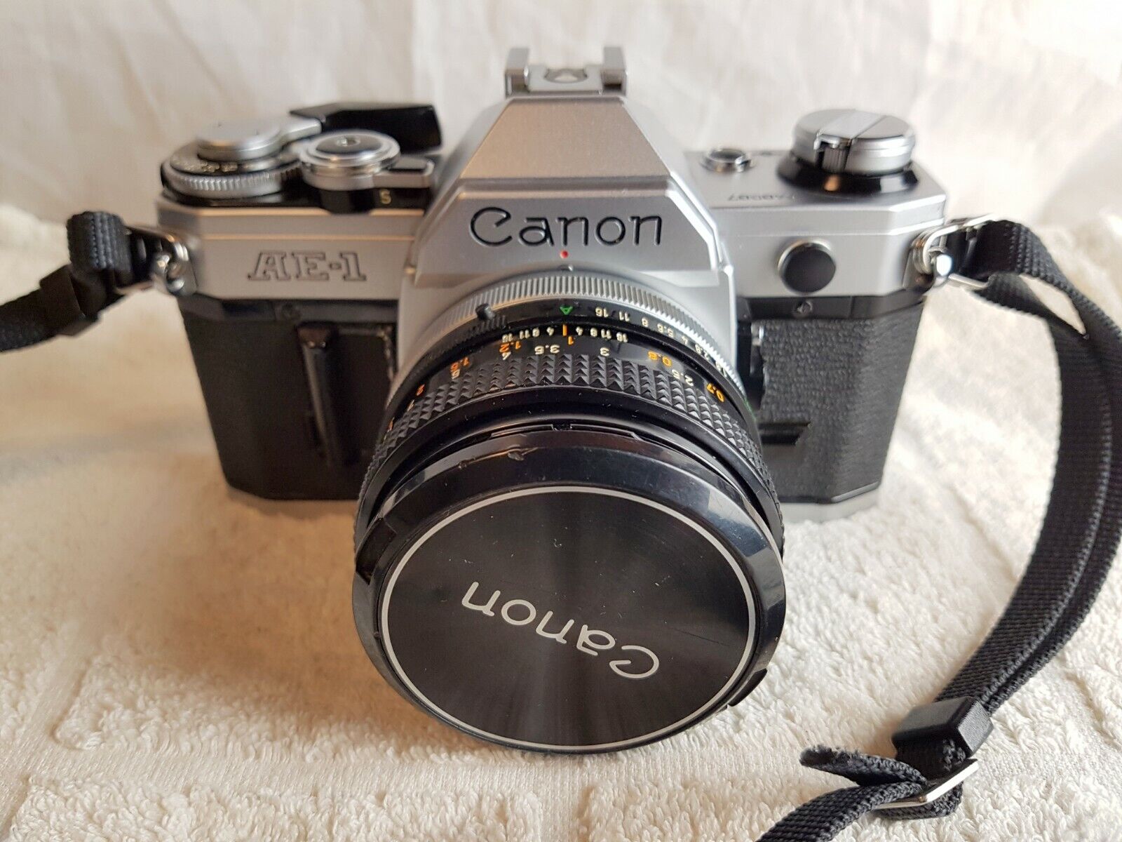 Silver Version Canon AE-1 Camera with Canon FD 50mm f1.8 Lens.