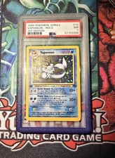 Pokemon 1999 Jungle Vaporeon 12/64 Holo 1st Edition PSA 7