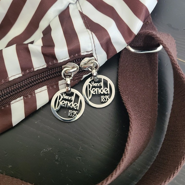 Henri Bendel Zip Around Packable Brown White Stripe Backpack  display picture 2